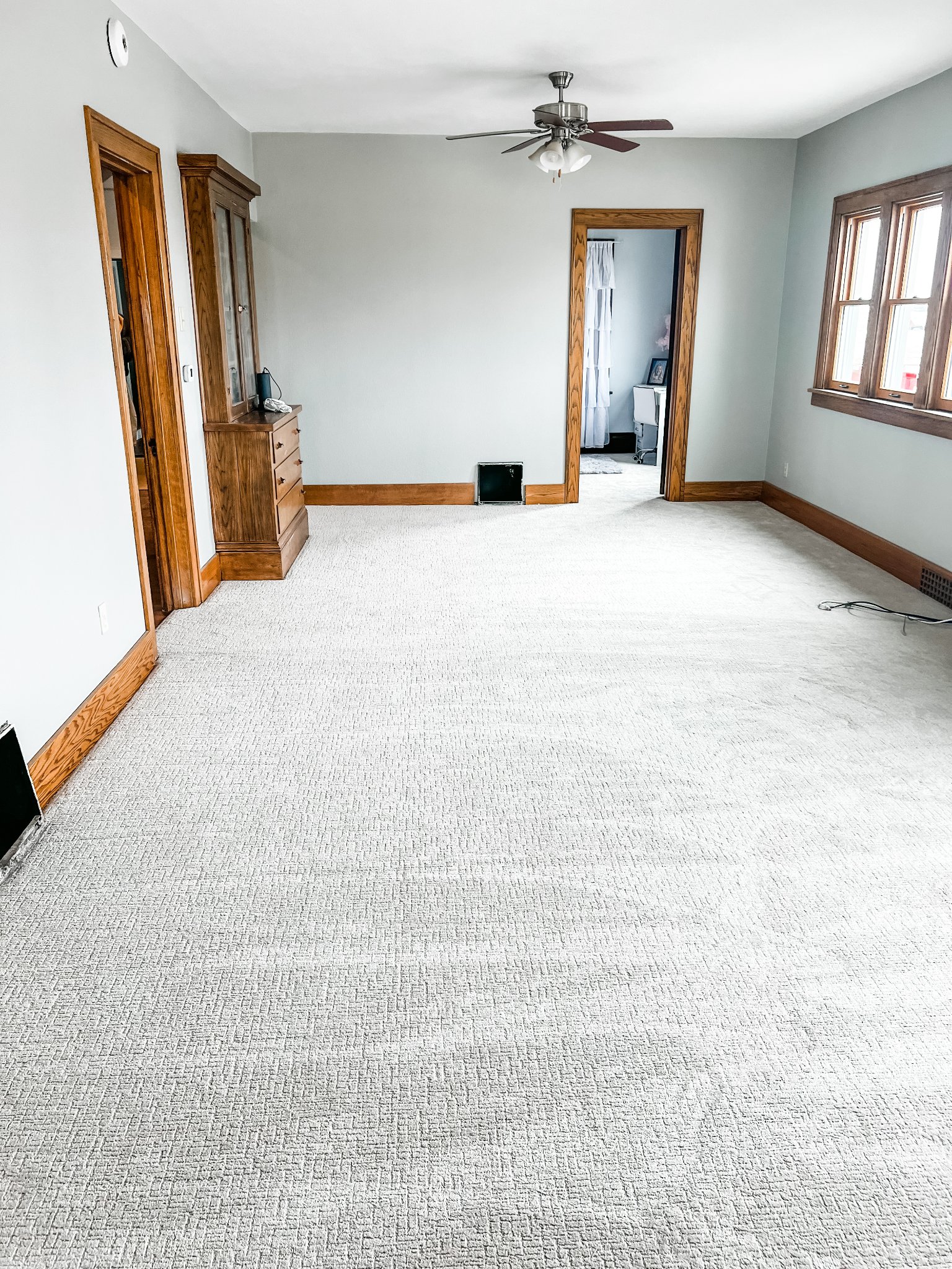 Finished carpet installation in a bedroom